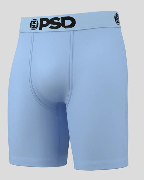 Light blue PSD brand boxer briefs with black waistband logo and center fly seam detail.
