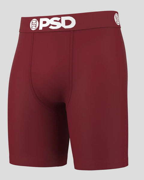 Burgundy PSD boxer briefs with white logo waistband and center seam detail.