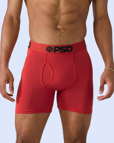 Red boxer briefs with black PSD waistband and functional fly opening.