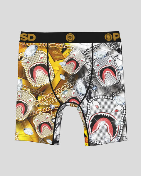 Three pairs of boxer briefs with shark mouth graphic prints in gold, white, and black colorways with 