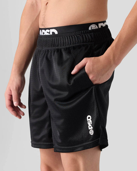 Black athletic shorts with ribbed waistband, side pockets, and white logo branding on leg and waistband.