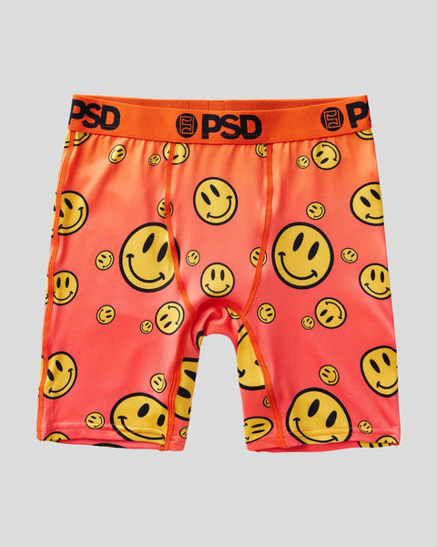 Orange boxer briefs with yellow smiley face pattern and PSD brand waistband.