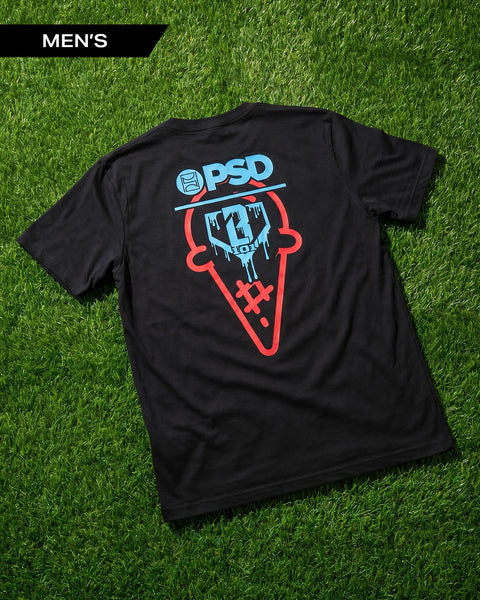 Black t-shirt with blue and red graphic design on back featuring PSD logo and game controller motif on grass background.