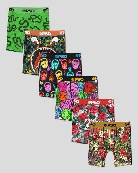 Six PSD boxer briefs with assorted prints including neon skulls, shark mouth, floral, and geometric patterns on gray backgrou