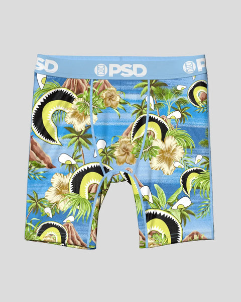Blue boxer brief with PSD waistband featuring yellow-eyed creatures, palm trees, flowers, and tropical foliage pattern.